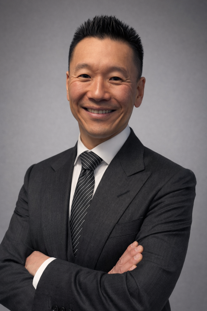 Professional headshot of a doctor